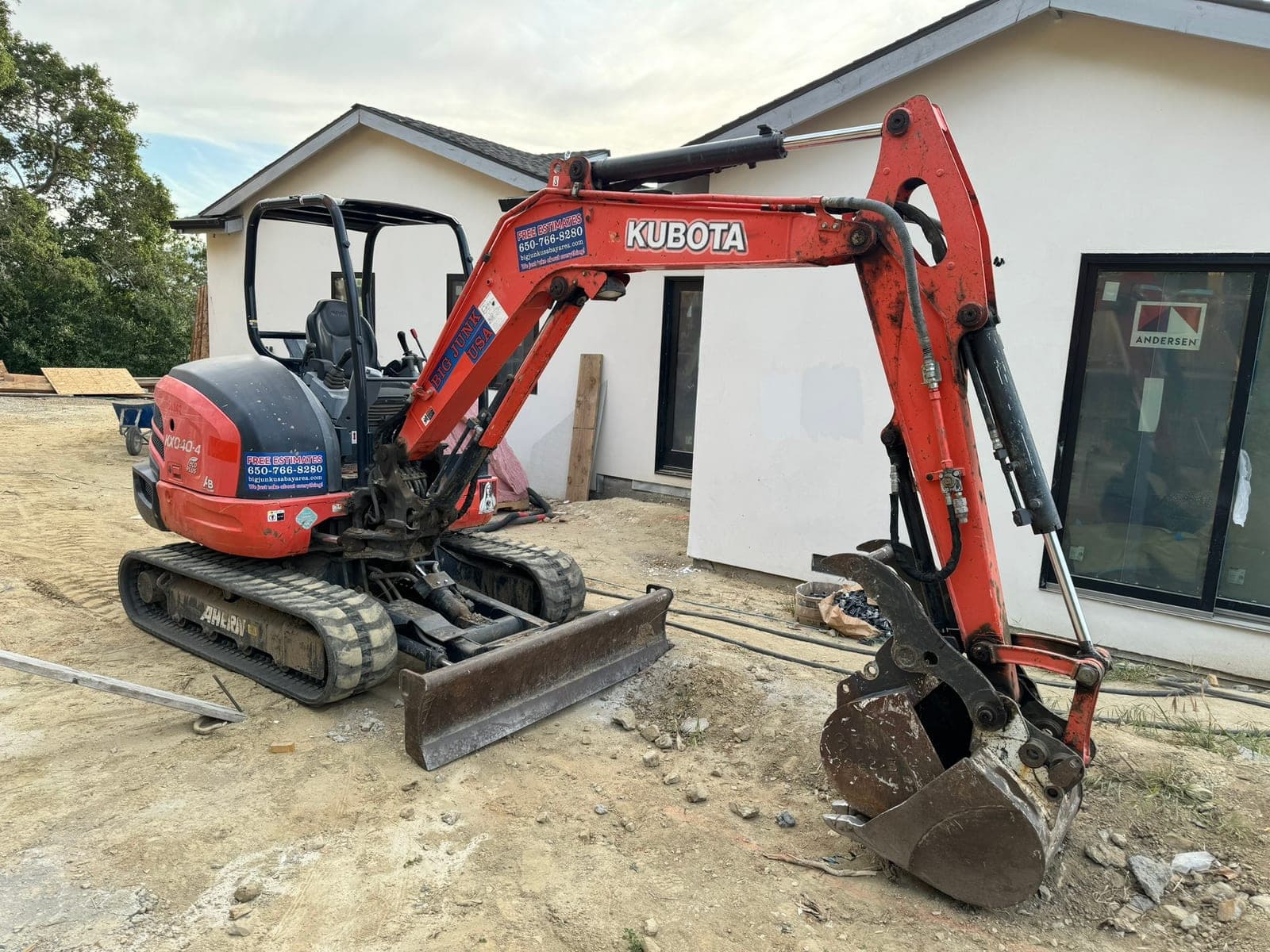 Big Junk USA Kubota excavator on a job site