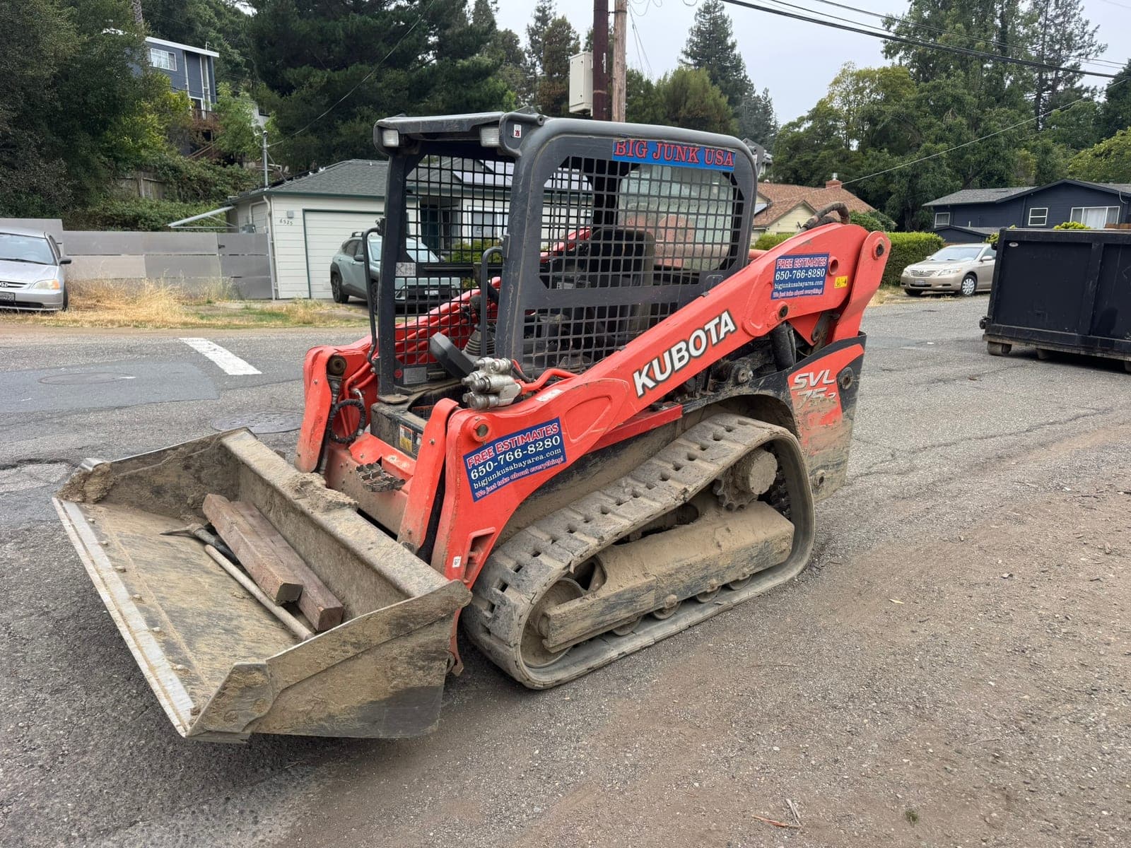Big Junk USA skid-steer on a job